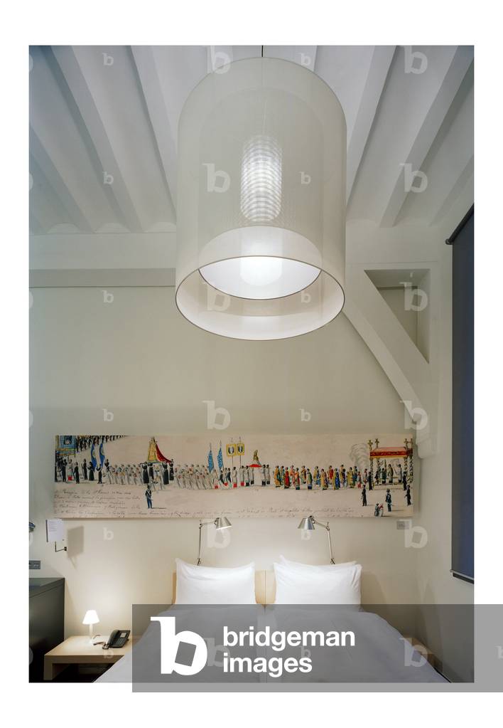The hotel Kruisheren in Maastricht, Netherlands (Netherlands) realized by Satijn more architects and Vos interieur Mapertuus in 2005. Photography 15/03/06. In the heart of the historic centre of Maastricht, the 15th century Kruisherenklooster was inaugurated as a hotel in May 2005. In a very contemporary and innovative style and furniture by the Dutch interior architect Henk Vos (Maupertuus) and the famous lighting architect Ingo Maurer.