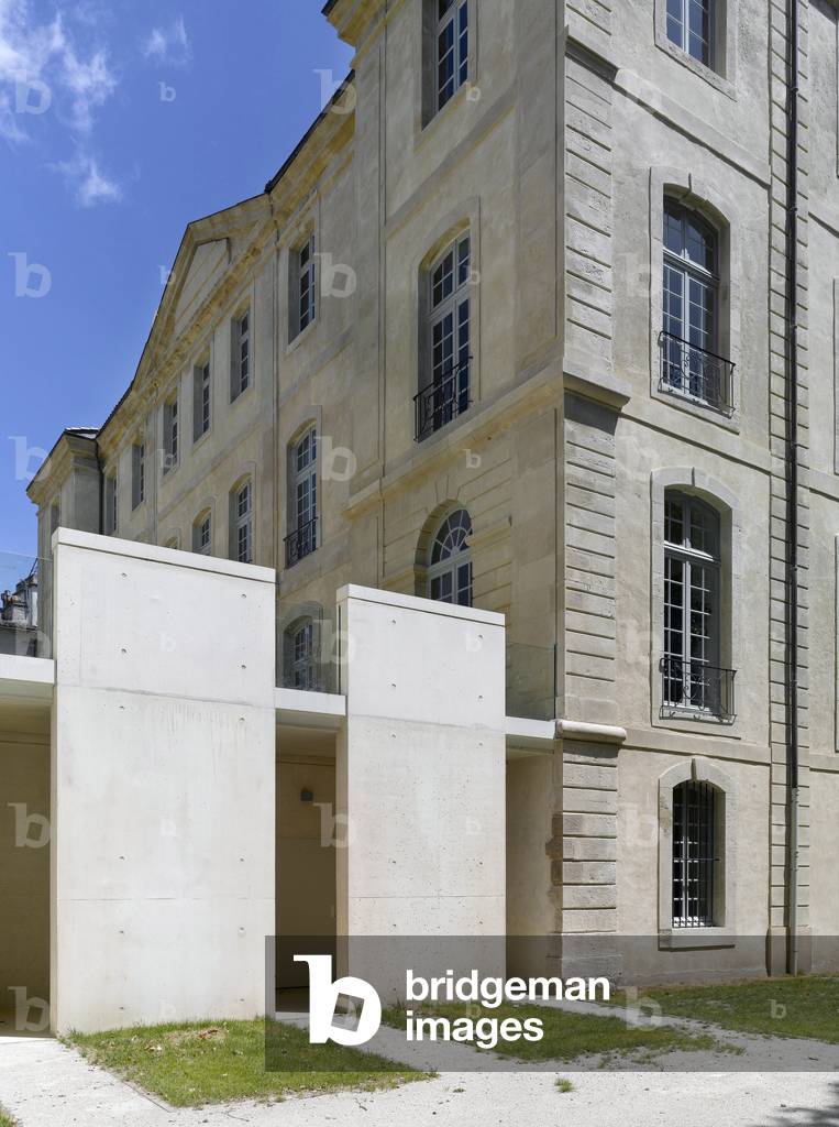 The mediatheque of Chateau d'Assas au Vigan (Gard). The General Council of Gard with the municipality of Vigan has financed the transformation of the Chateau d'Assas (1751-1759) into a House of Books and Scriptures, built around three peaks, a mediatheque, a house of culture of the territory and a departmental resource centre. Architecture Opus 5 Architects.