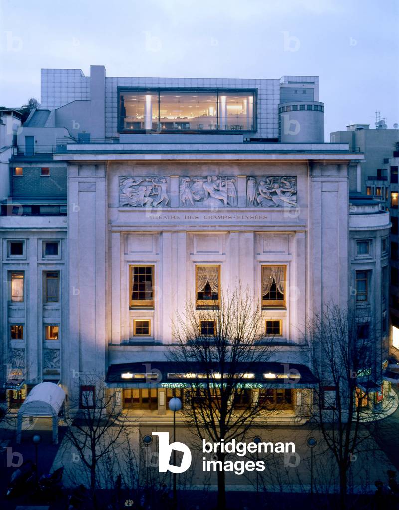 Theatre des Champs Elysees, 13-15 avenue Montaigne in Paris 75008. Architects Les Freres Auguste (1874-1954) and Gustave (1876-1952) Perret and Henry Van de Velde (1863-1957). Since its construction in 1913, this theatre was perceived as a symbol of French architectural modernity through its classical writing combined with the use of the new concrete. The marble-covered facade incorporates three high reliefs by Antoine Bourdelle (1861-1929).