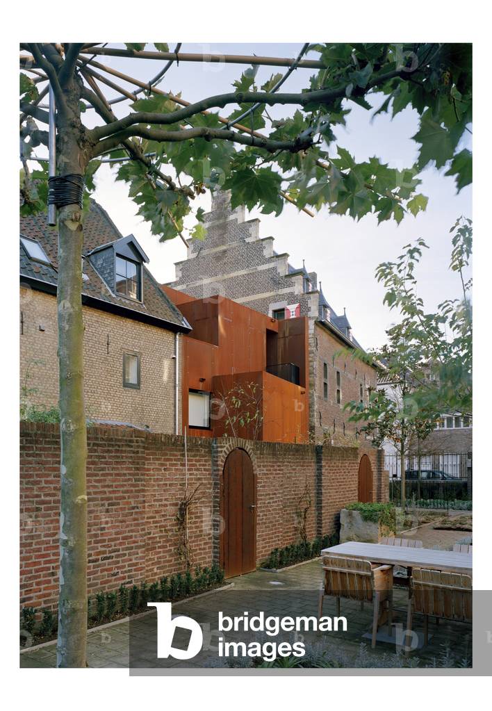 The hotel Kruisheren in Maastricht, Netherlands (Netherlands) realized by Satijn more architects and Vos interieur Mapertuus in 2005. Photography 15/03/06. In the heart of the historic centre of Maastricht, the 15th century Kruisherenklooster was inaugurated as a hotel in May 2005. In a very contemporary and innovative style and furniture by the Dutch interior architect Henk Vos (Maupertuus) and the famous lighting architect Ingo Maurer.