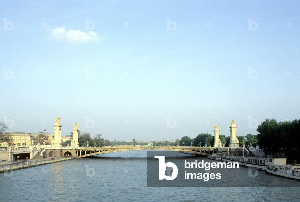 Pont Alexandre III in Paris in the 8th arrondissement. Tsar Alexander III (1846-1894) laid the first stone of the bridge in 1886, which was to be completed for the 1900 World Exhibition. One of the most beautiful bridges in Paris has a single-flight metal structure.