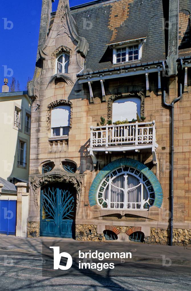 La Maison Houot, 92 bis Quai le Lorrain in Nancy (Meurthe and Moselle). Architect Emile Andre (1871-1933), 1903. In Nancy, Art Nouveau takes the name of Ecole de Nancy, or Alliance provincial des industries d'art, thanks in particular to the emblematic figure of Emile Galle. Glassware, furniture, stained glass, ceramics, leather, ironwork, architecture, etc., participate in this vast movement of renovation of decorative arts that still marks the city today.