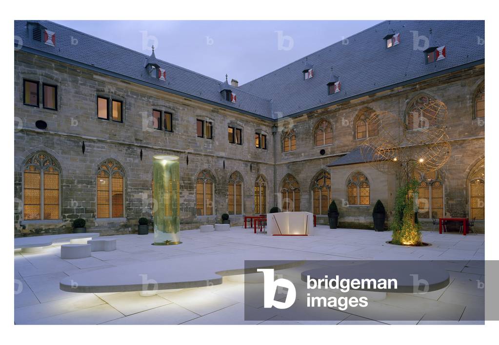 The hotel Kruisheren in Maastricht, Netherlands (Netherlands) realized by Satijn more architects and Vos interieur Mapertuus in 2005. Photography 15/03/06. In the heart of the historic centre of Maastricht, the 15th century Kruisherenklooster was inaugurated as a hotel in May 2005. In a very contemporary and innovative style and furniture by the Dutch interior architect Henk Vos (Maupertuus) and the famous lighting architect Ingo Maurer.