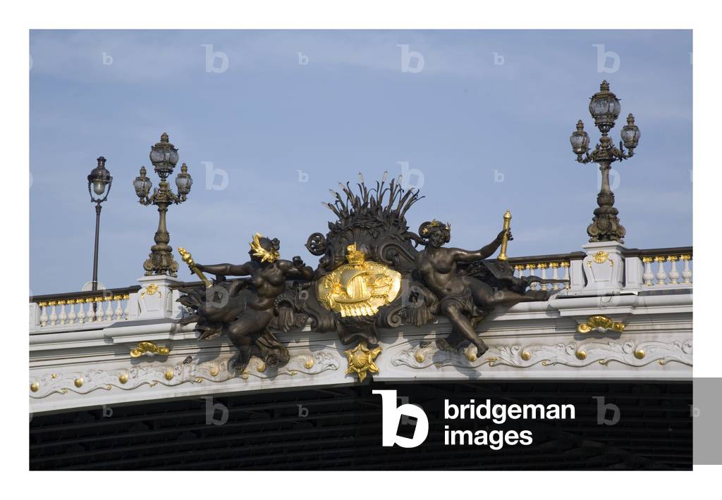 The Alexandre III Bridge in Paris. Tsar Alexander III of Russia (1845-1894) laid the first stone of the bridge in 1886, which was to be completed for the 1900 World Expo. One of the most beautiful bridges in Paris has a single-flight metal structure. Photography 10/03/06.