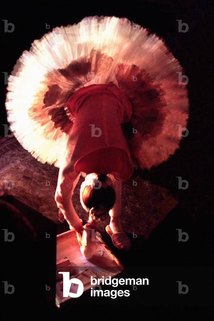 Bolshoi ballerina tying her