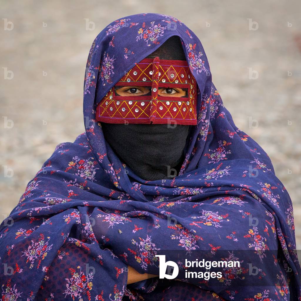 A Bandari Woman Wearing A Traditional Mask Called The Burqa At Panjshambe Bazar Thursday Market, Hormozgan, Minab, Iran, 2015 (photo)