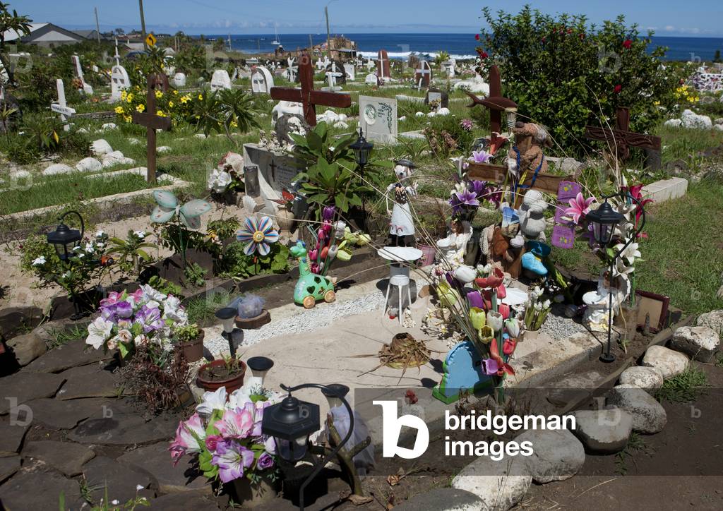 Decorated Tombs in Hanga Roa Cemetery, Easter Island, Chile (photo)