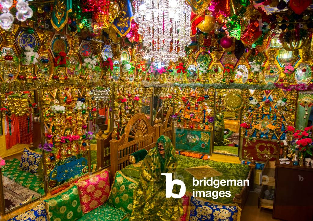 bride in the decorated room for traditional wedding, Hormozgan, Bandar-e Kong, Iran (photo)
