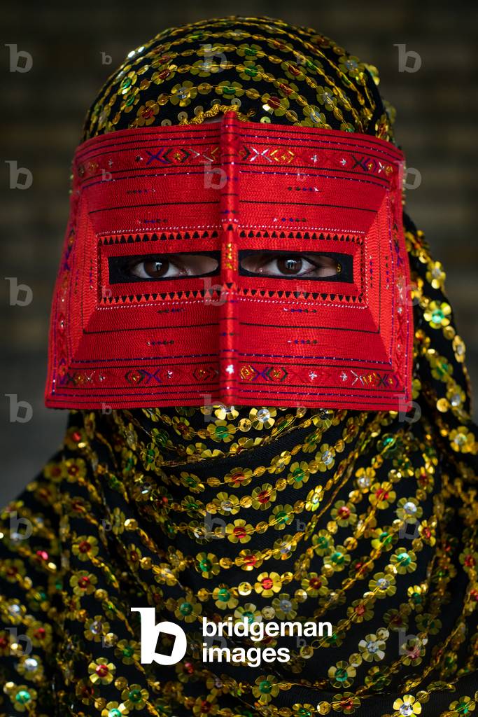 A Bandari Woman Wearing A Traditional Mask Called The Burqa, Hormozgan, Minab, Iran, 2015 (photo)