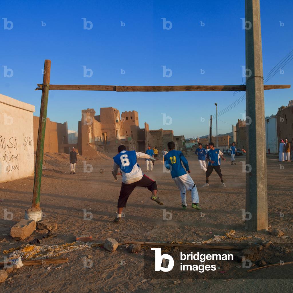 People Playing Football in Najran Old Town, Saudi Arabia (photo)