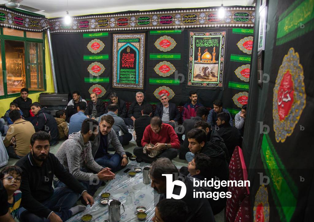 Iranian Shiite Muslim Men Having a Nazri Charity Diner during Muharram before Ashura Celebrations, Golestan Province, Gorgan, Iran (photo)