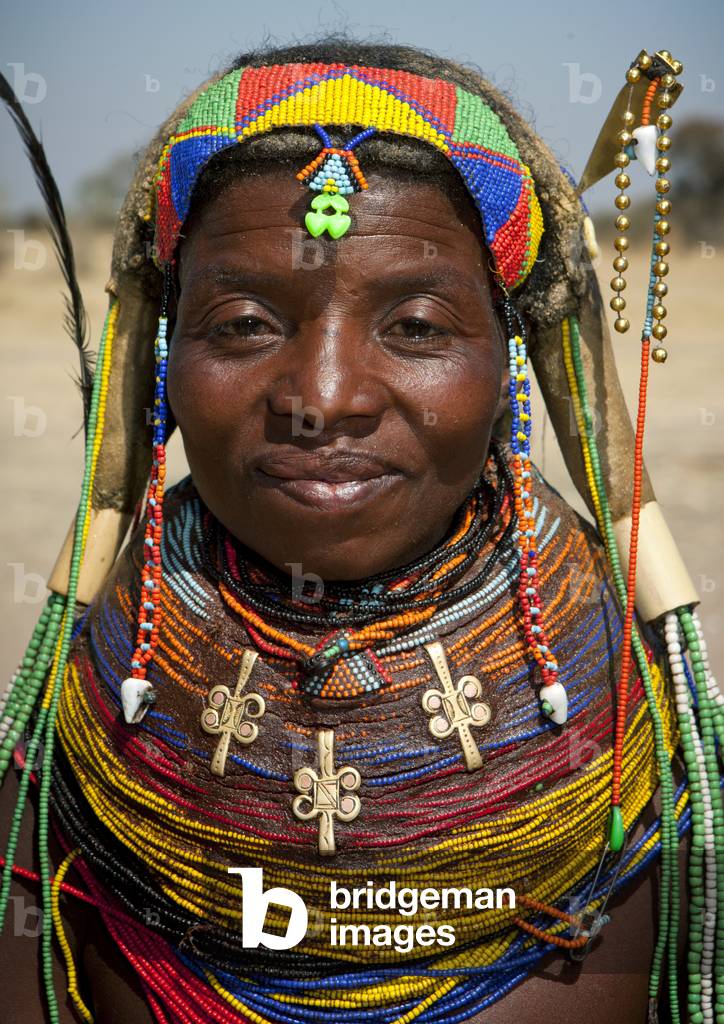 Mumuhuila Woman Wearing the Traditional Giant Necklace, Hale Village, Angola, Africa (photo)