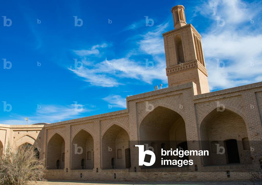 Wind tower used as a natural cooling system in a caravanserai, Ardakan County, Aqda, Iran (photo)