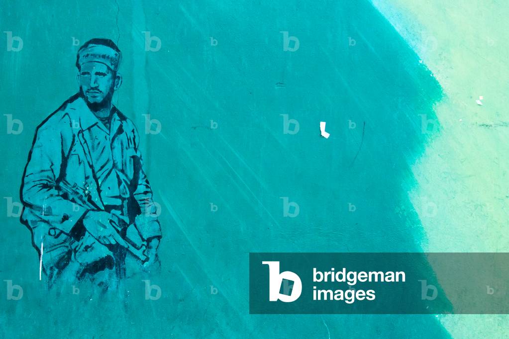 Anti-american mural propaganda on the wall of the former United States Embassy, Central district, Tehran, Iran (photo)