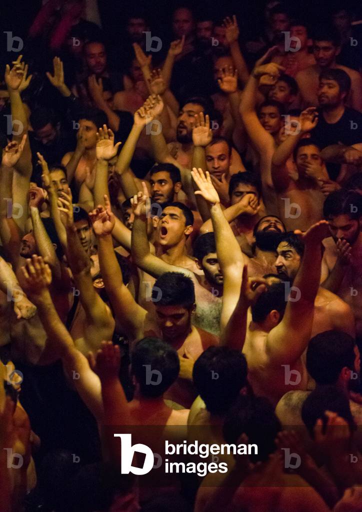 Iranian Shiite Muslim Mourners From the Mad of Hussein Community Chanting and Self-flagellating during Muharram, Isfahan Province, Kashan, Iran (photo)