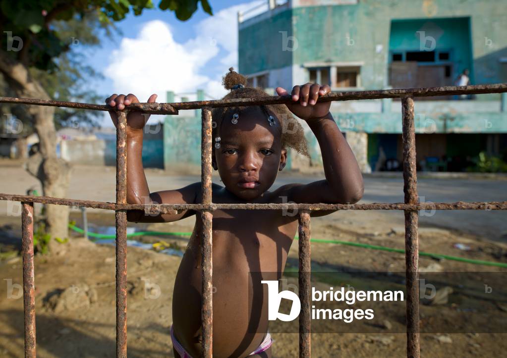 Young Girl in a Former Army Base that Became a Squat, Lobito, Angola, Africa (photo)