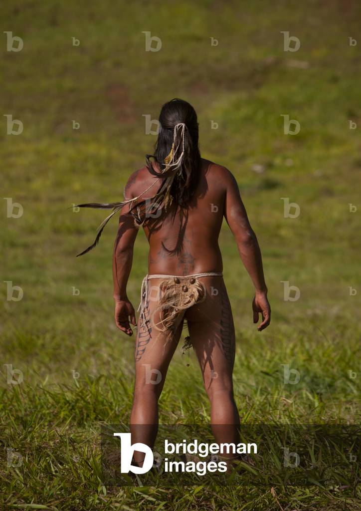 Man during Haka Pei Competition, Tapati Festival, Easter Island, Chile (photo)