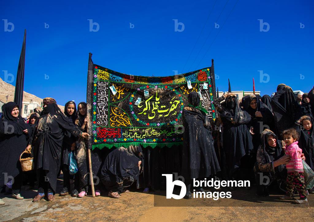 Iranian Shiite Muslim Women Covered in Mud, Chanting and Self-flagellating during Ashura, Kurdistan Province, Bijar, Iran (photo)