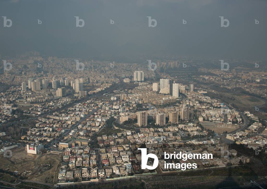 View of the city with the pollution cloud from the top of the milad tower, Central district, Tehran, Iran (photo)