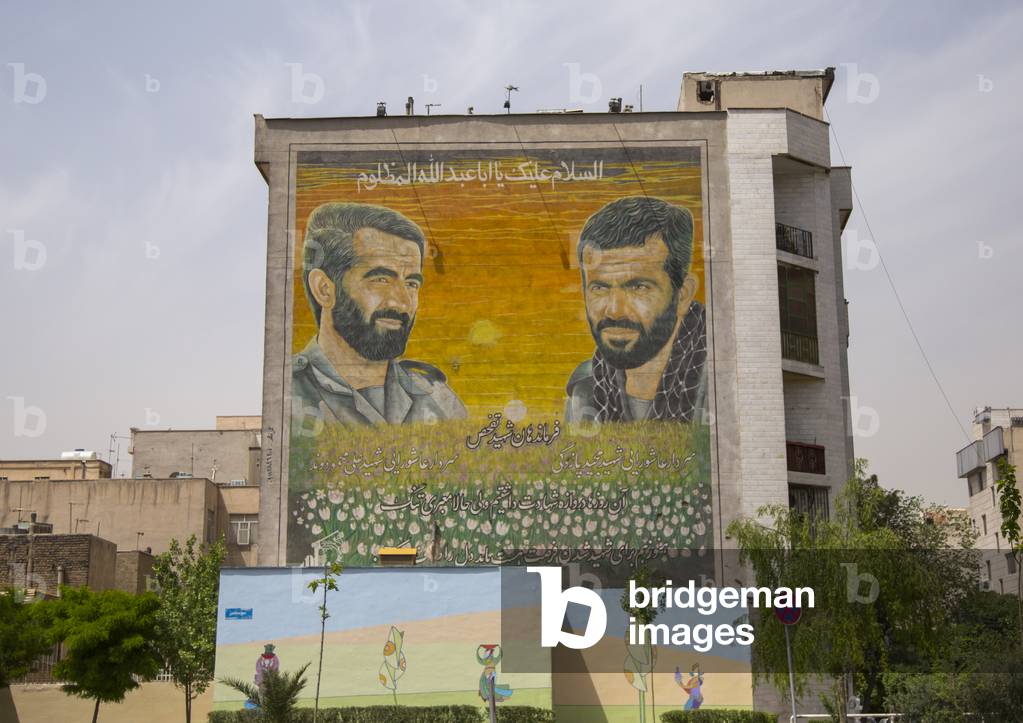 Sign paying homage to soldiers fallen during the war between Iran and Iraq (1980-88), Shemiranat county, Tehran, Iran (photo)