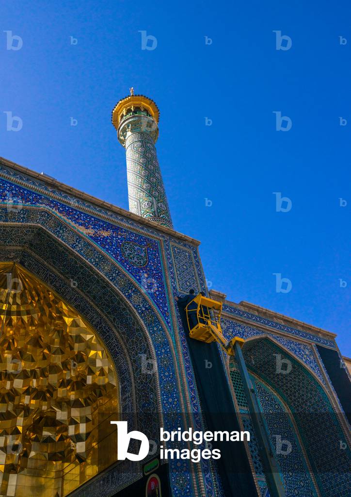 Worker Covering Fatima Al-masumeh Shrine with Black Banner for Ashura, Central County, Qom, Iran (photo)