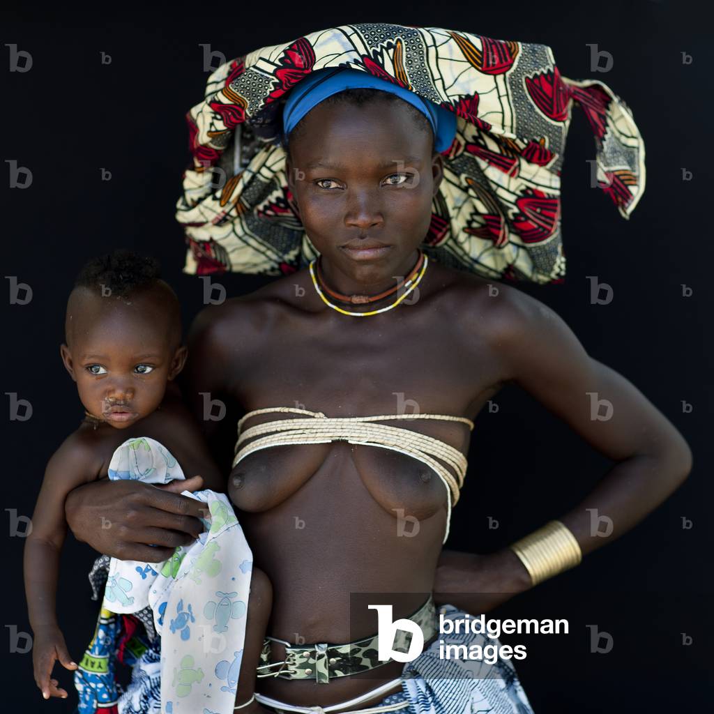 Mucubal Woman with Ompota And Oyonduthi Bra Carrying her Baby, Virie Area, Angola, Africa (photo)