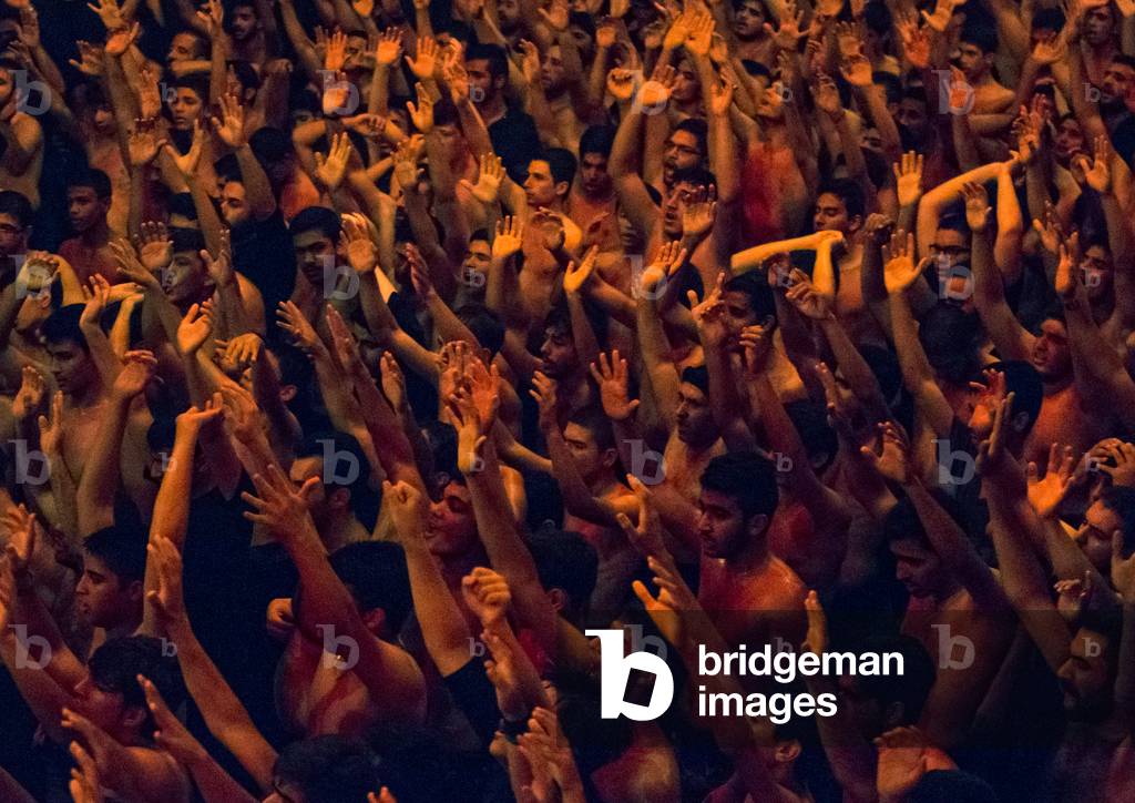 Iranian Shiite Muslim Mourners From the Mad of Hussein Community Chanting and Self-flagellating during Muharram, Isfahan Province, Kashan, Iran (photo)