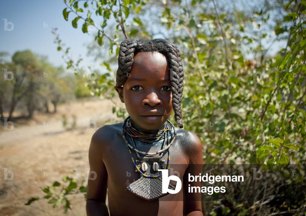 Himba Girl Wearing a Traditional Necklace, Village of Hoba Haru, Angola, Africa (photo)