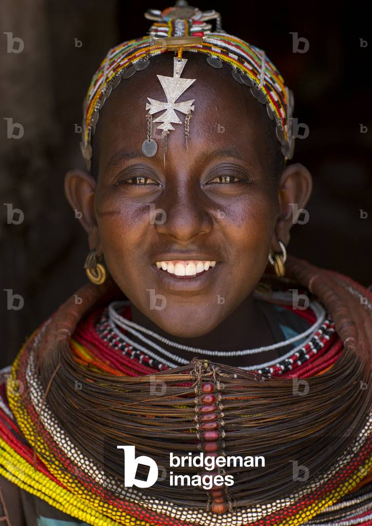 Rendille tribeswoman wearing traditional headdress and mpooro engorio necklace, Marsabit district, Ngurunit, Kenya, Africa (photo)