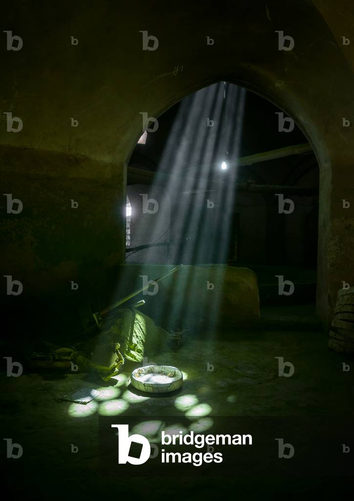 Sunlight into a Traditional Henna Mill, Yazd Province, Yazd, Iran (photo)