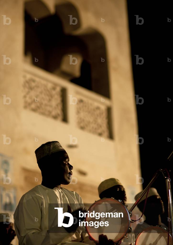 Drums musicians on stage playing during maulidi festival, Lamu Kenya, Africa
 (photo)