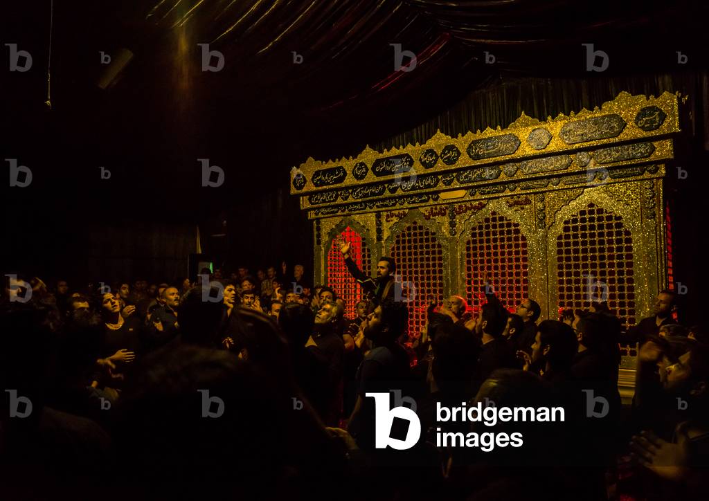 Iranian Shiite Muslim Men in a Mosque Chanting and Self-flagellating during Ashura, Isfahan Province, Kashan, Iran (photo)