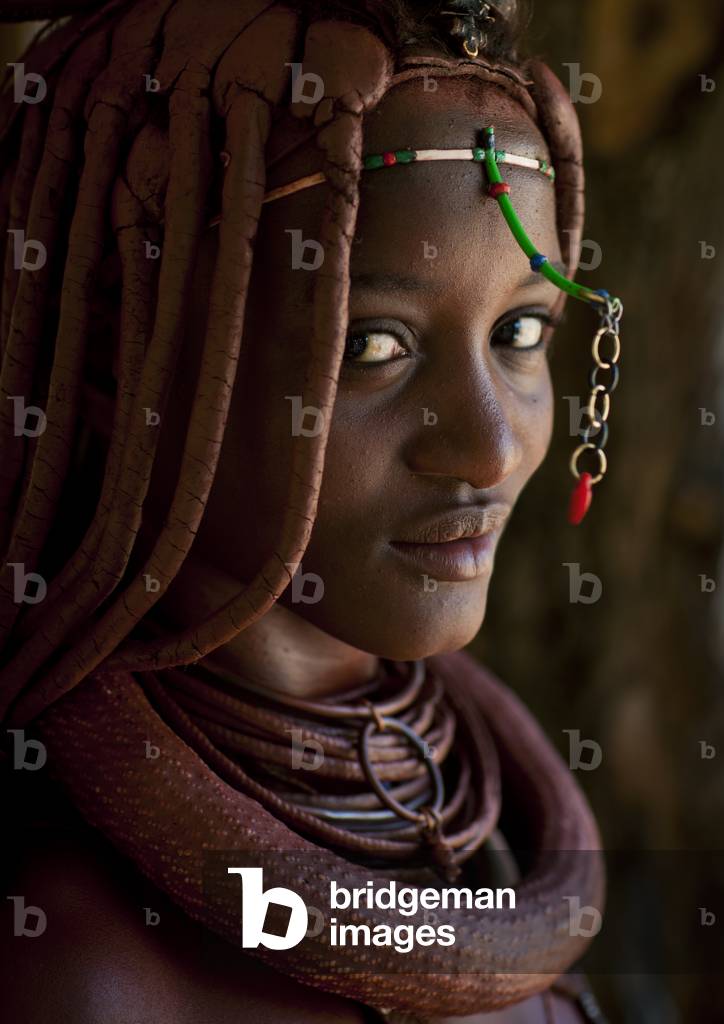 Himba Woman called Mucaniama Wearing a  Plastic Jewel, Village of Hoba Haru, Angola, Africa (photo)