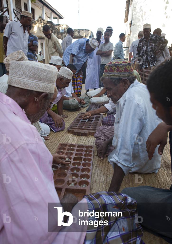 Players of bao during maulidi festival, Lamu, Kenya, Africa (photo)