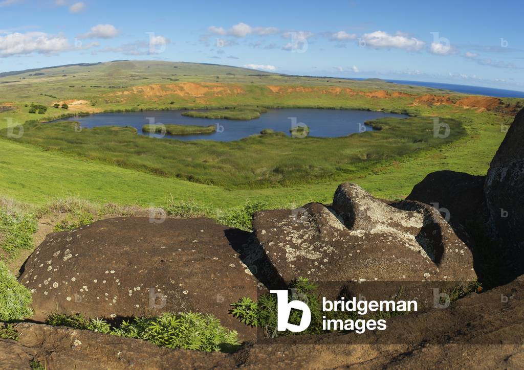 Lying Moai over Rano Raraku Lake, Easter Island, Chile (photo)