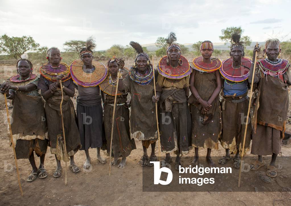 Group of pokot women wearing large necklaces made from the stems of sedge grass, Baringo county, Baringo, Kenya, Africa (photo)