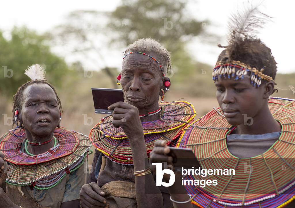 Pokot women wear large necklaces made from the stems of sedge grass, Baringo county, Baringo, Kenya, Africa (photo)