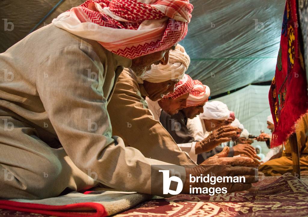 Men dancing during a wedding ceremony, Qeshm Island, Tabl, Iran (photo)