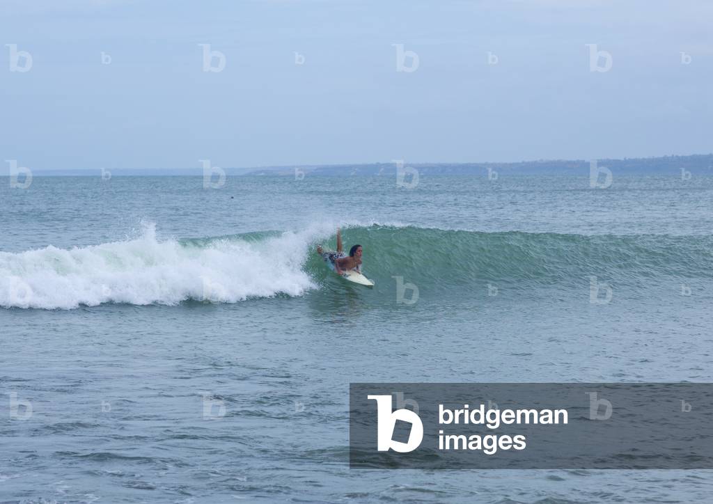 Boy Surfing at Capo Iedo, Angola, Africa (photo)