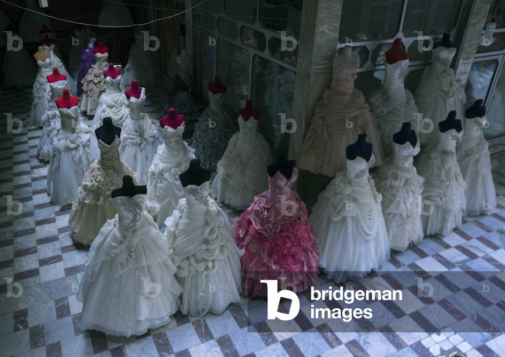 At a wedding dress shop in the bazaar, Isfahan province, Kashan, Iran (photo)