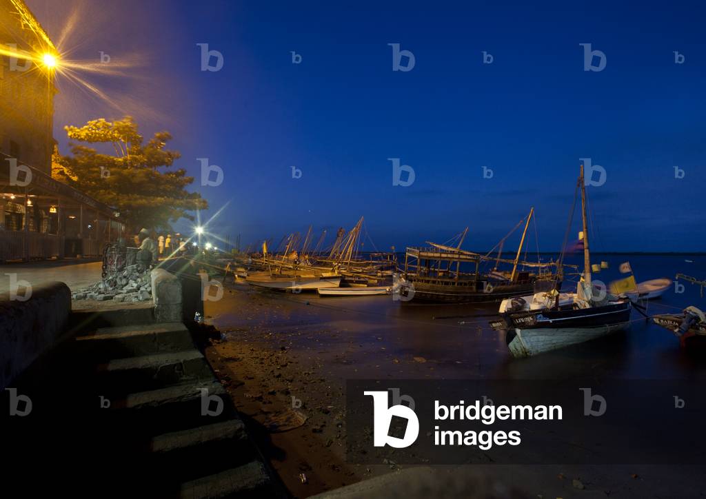 Dhows standing by the dockside of lamu Kenya, Africa by night (photo)