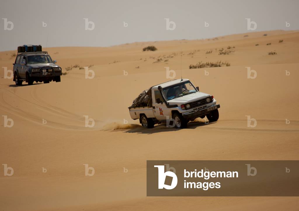 Tourists Doing a Safari Tour in Four Wheel Drives in the Namib Desert, Iona National Park, Angola, Africa (photo)