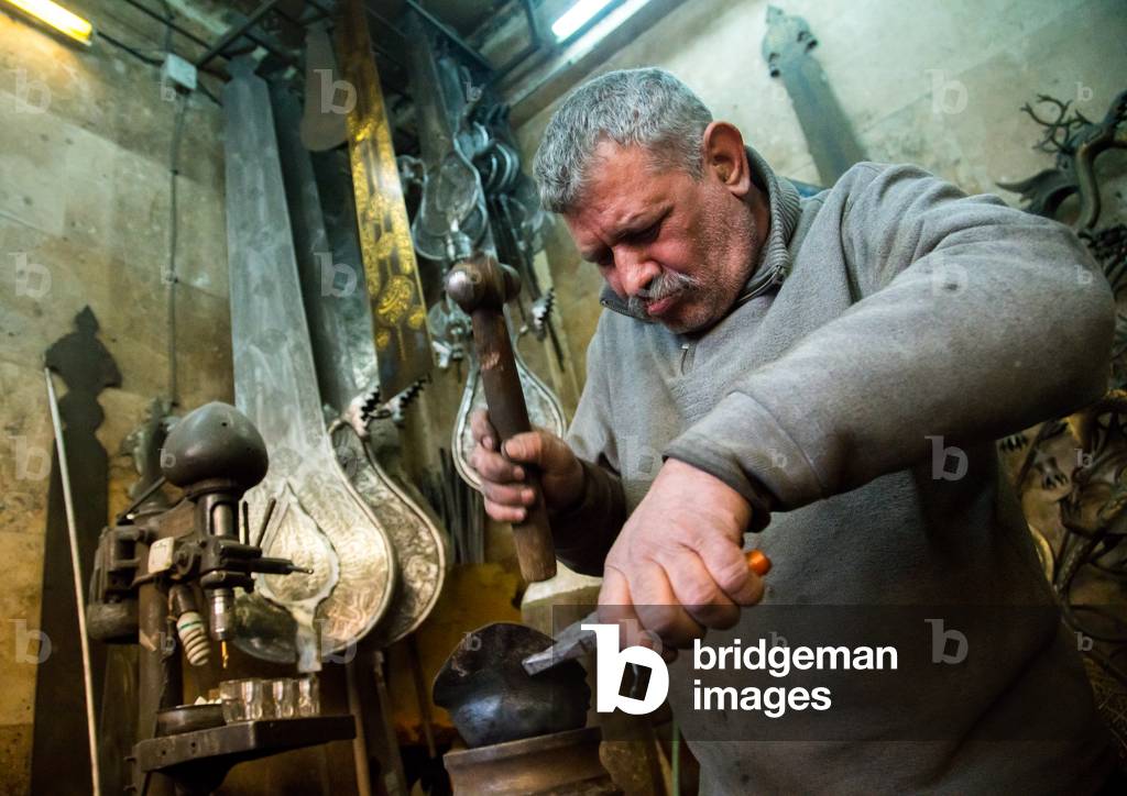 Master Safar Fooladgar Creating An Alam In His Workshop, Central District, Tehran, Iran, 2015 (photo)