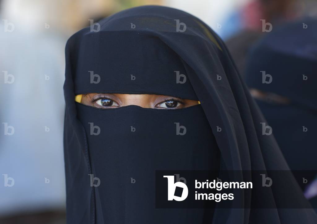 Miss fahra swabir with her burqa, Lamu town Kenya, Africa (photo)