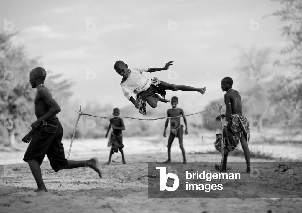 Mukubal Kids Doing High Jumping, Virie Area, Angola, Africa (photo)