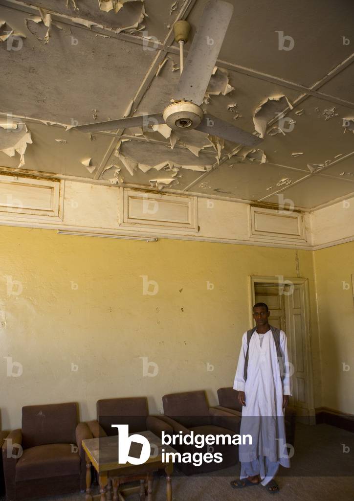Man Standing in An Old English House, Erkowit, Red Sea Hills, Sudan (photo)