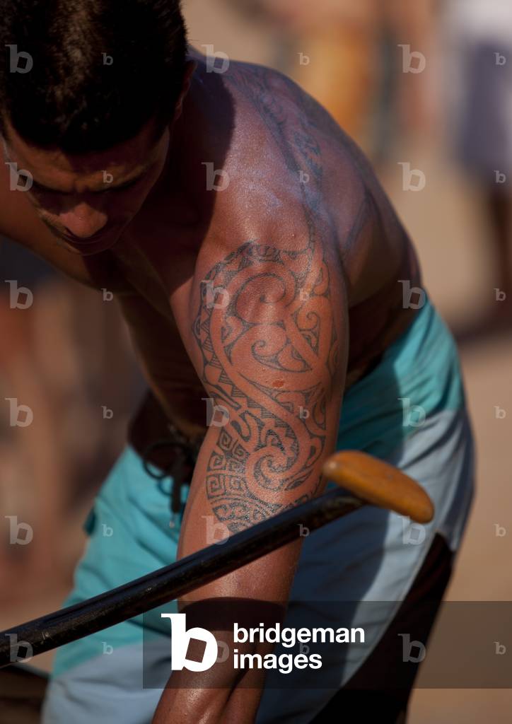 Tattooed Man Ready For Canoe Competition at Anakena beach, Easter Island, Chile (photo)