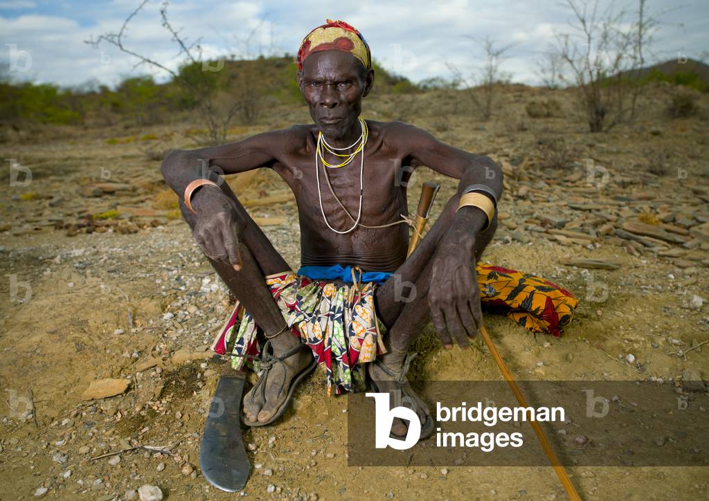 Old Mucubal Man Sitting, Virie Area, Angola, Africa (photo)