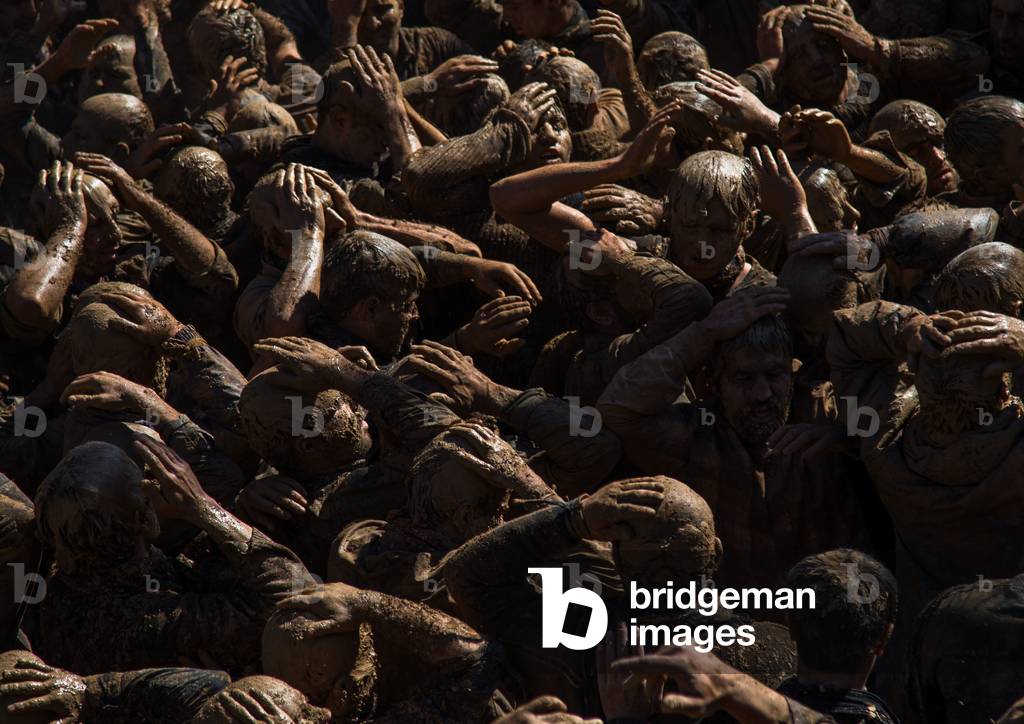 Iranian Shiite Muslim Men Covered in Mud, Chanting and Self-flagellating during Ashura, Kurdistan Province, Bijar, Iran (photo)