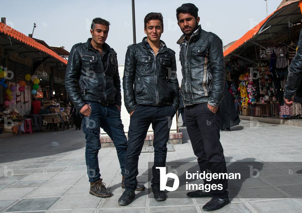 Portrait Of Iranian Men With Leather Jackets In Ganjali Bazaar, Central County, Kerman, Iran, 2016 (photo)